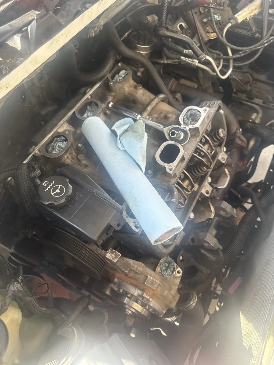Cylinder head laid out with the tools that came off it, Riverside area