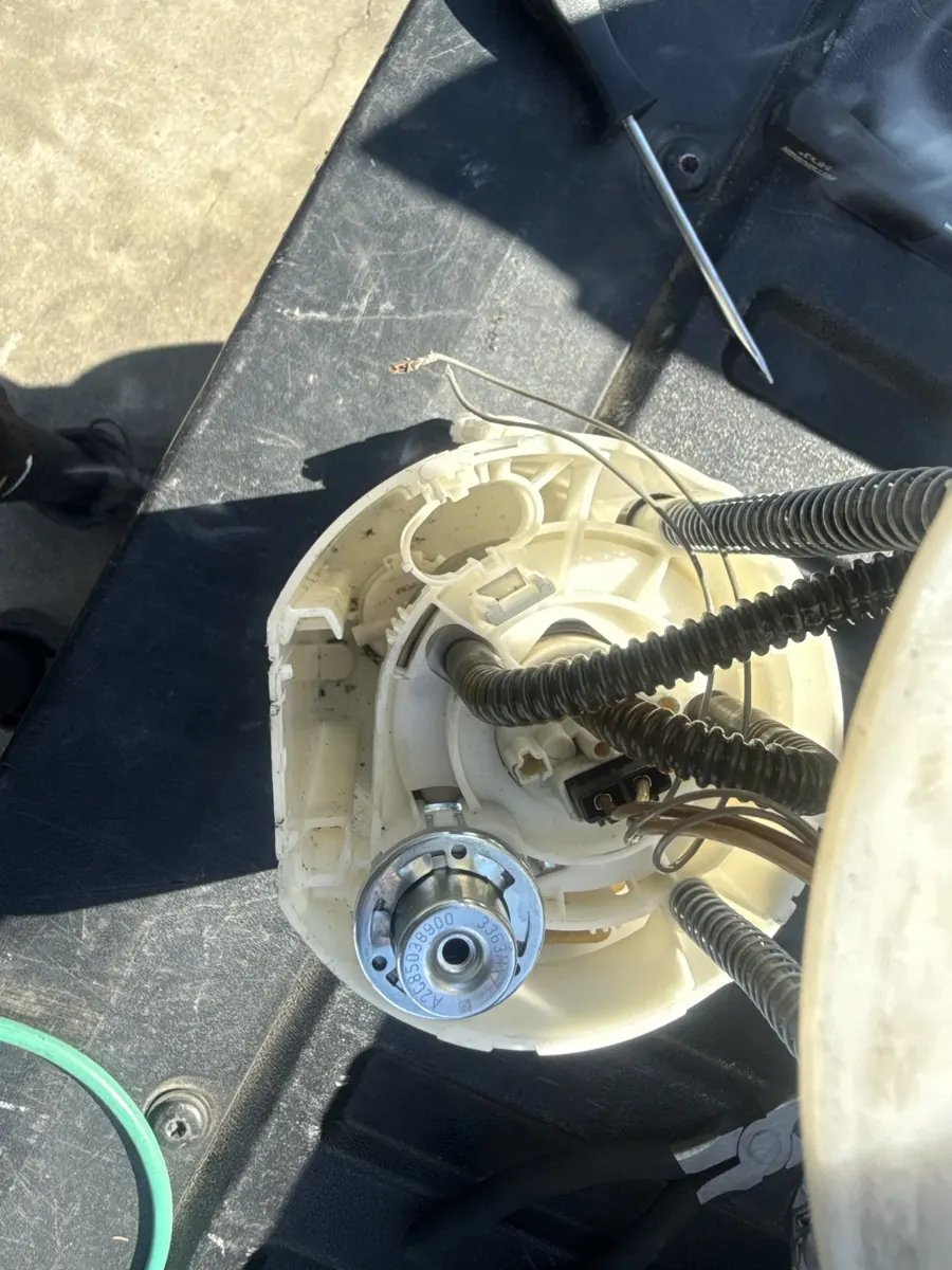 Fuel pump sender assembly out of the tank, Hemet area