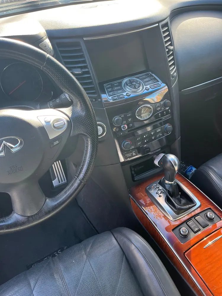 The center console and climate controls of an SUV