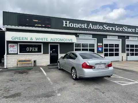 Green & White Automotive in Spring